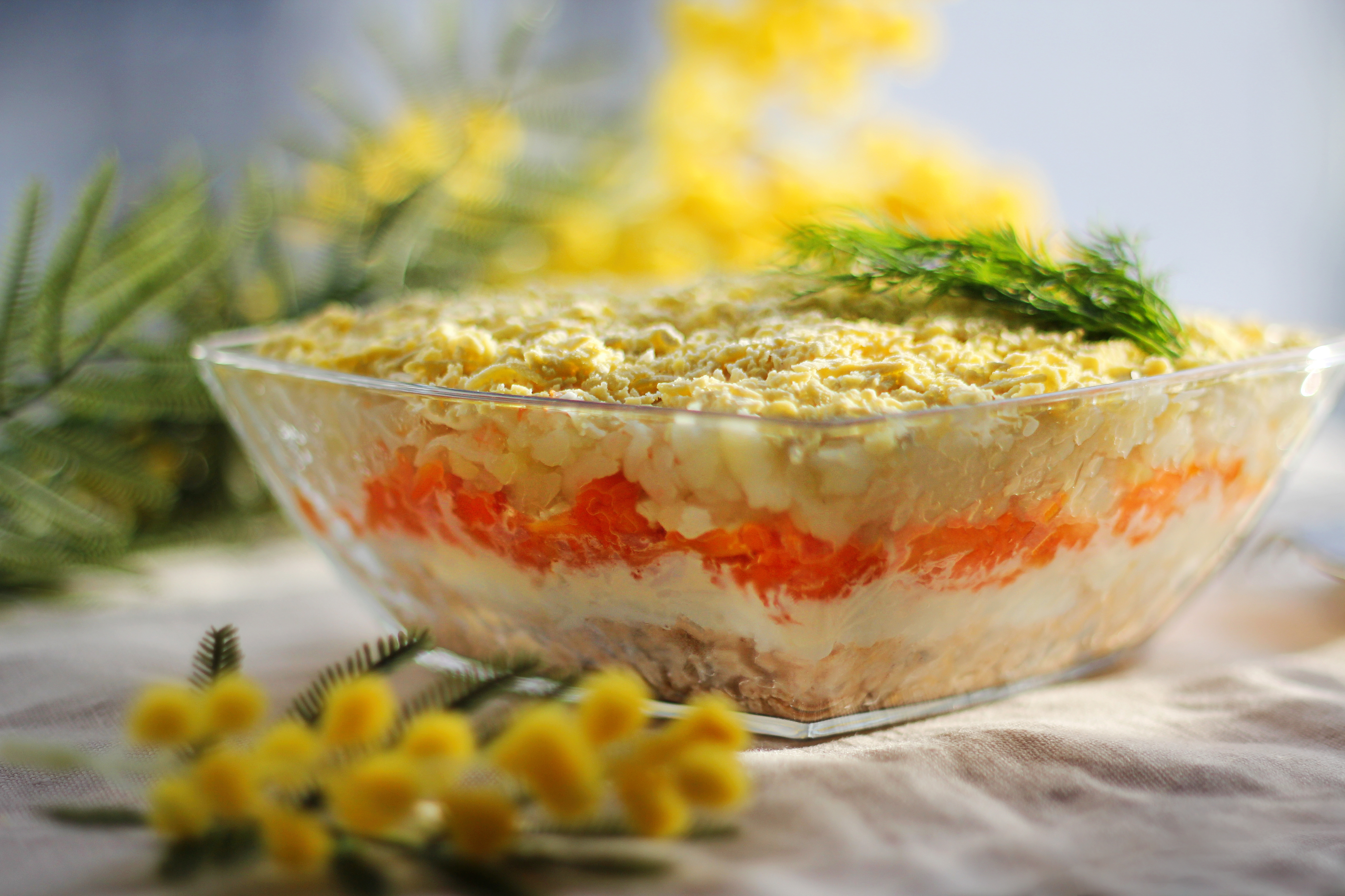 Traditional,Russian,Mimosa,Salad,With,Fish,,Eggs,,Potatoes,And,Carrots.