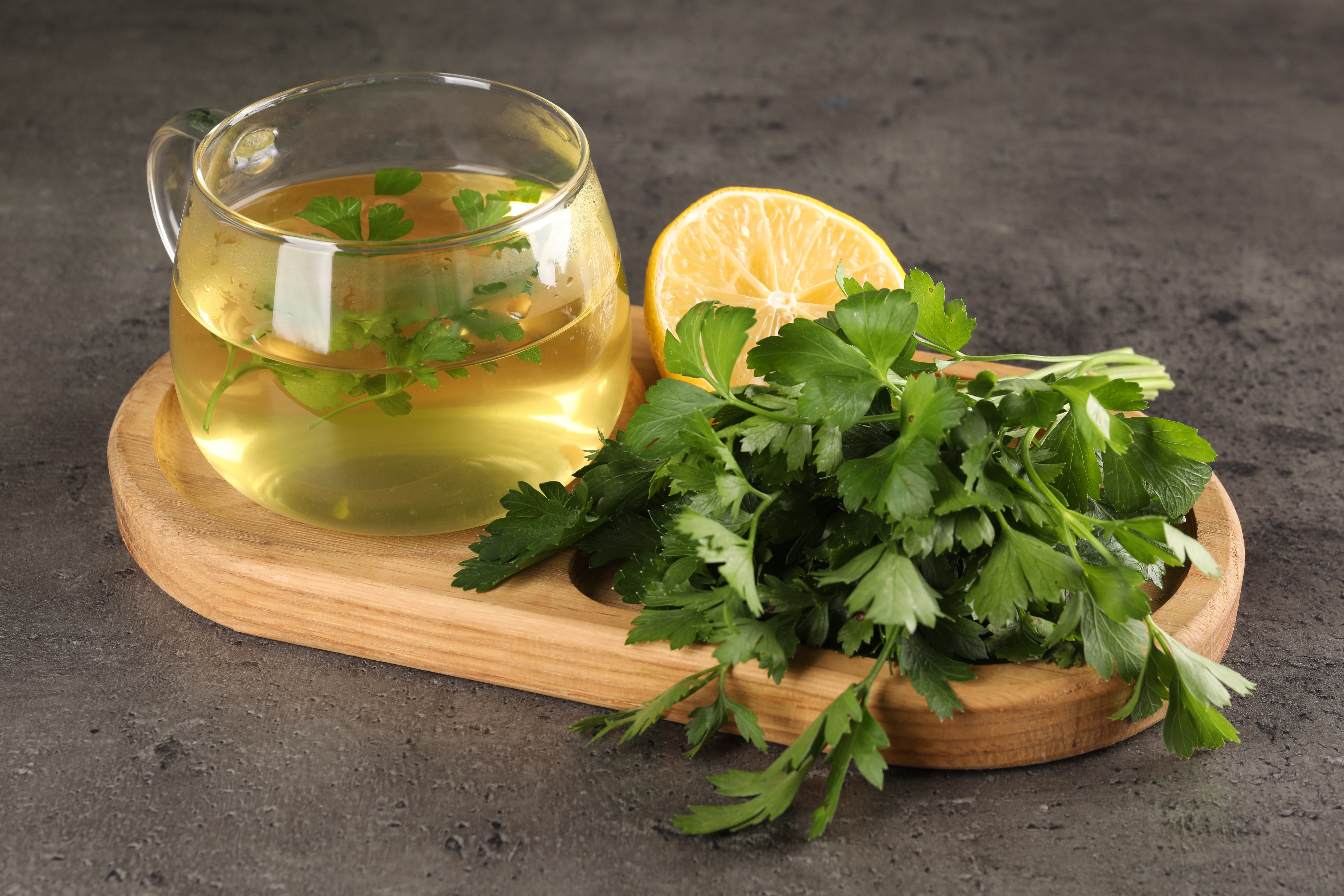 Aromatic,Tea,,Fresh,Parsley,And,Lemon,On,Grey,Table,,Closeup