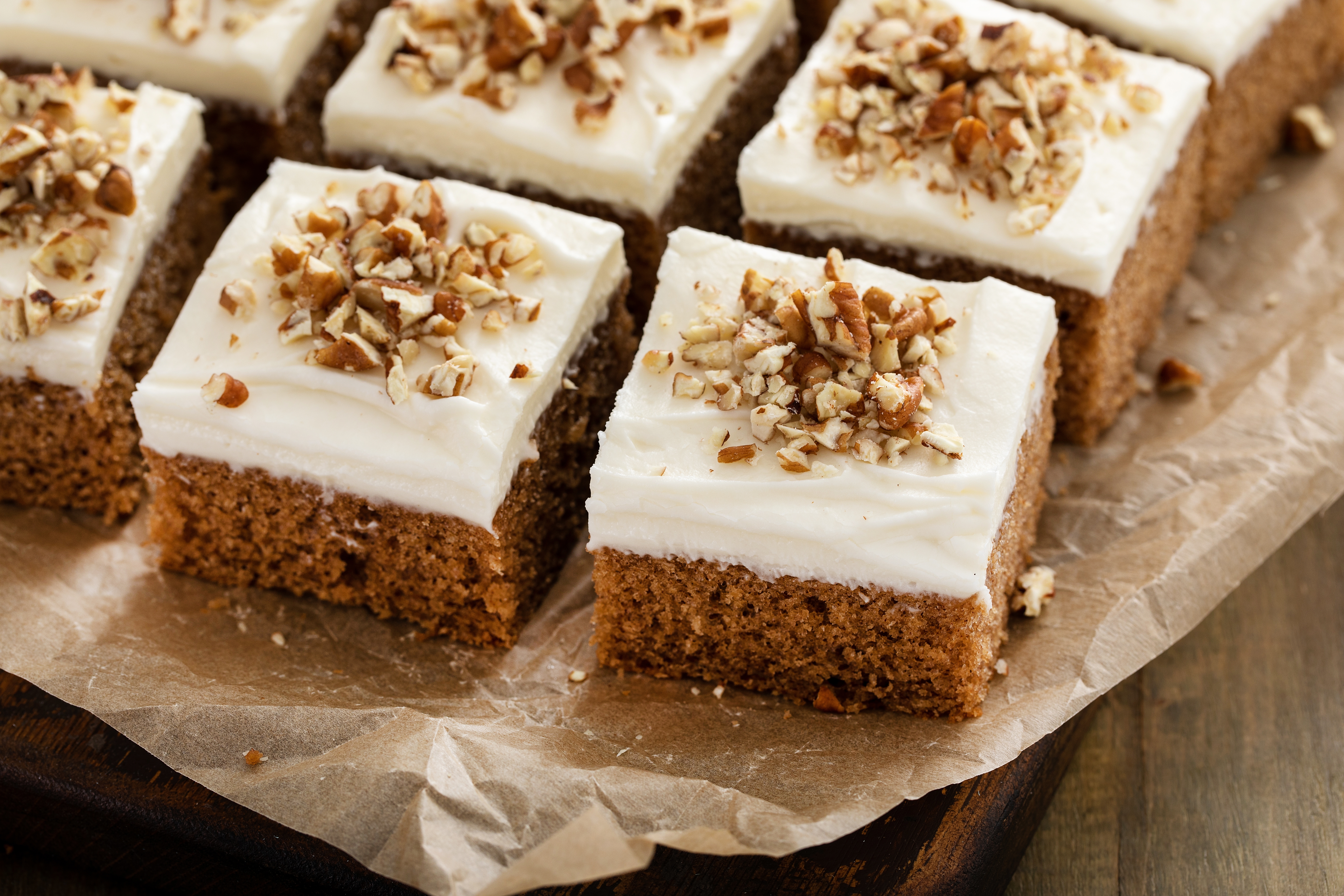 Carrot,Or,Spice,Cake,With,Cream,Cheese,Frosting,And,Pecan