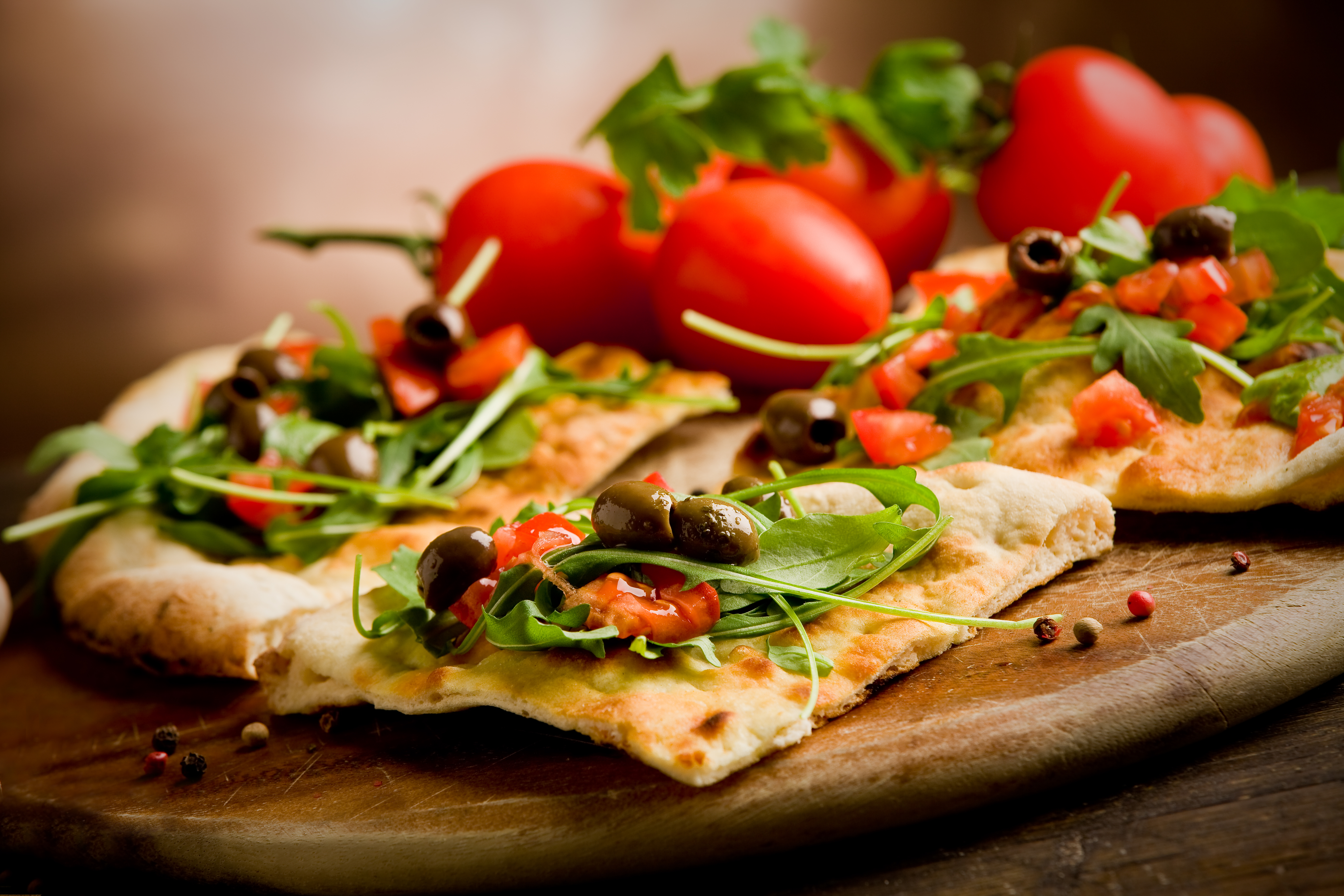 Photo,Of,Delicious,Vegetarian,Pizza,With,Arugula,On,Wooden,Table