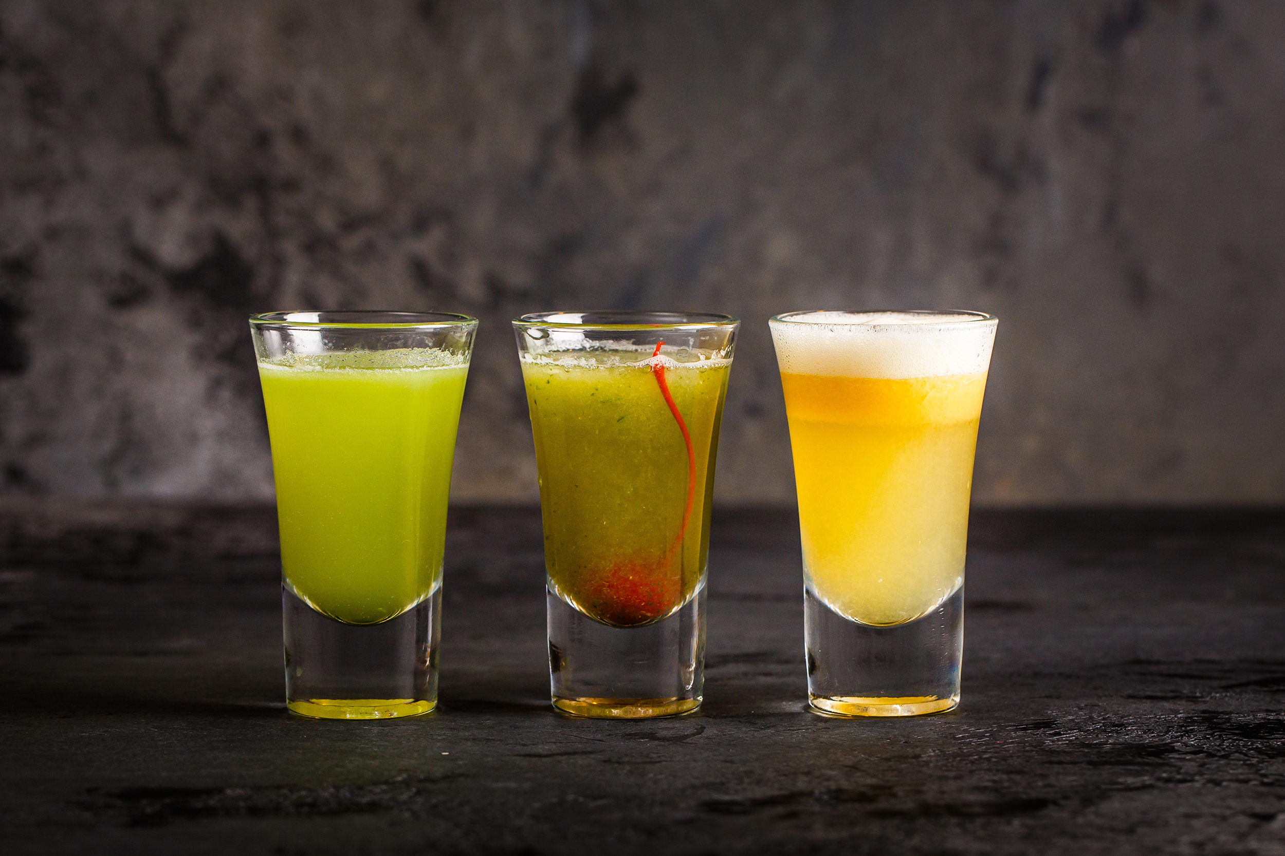 Alcoholic,Shots,On,A,Black,Background