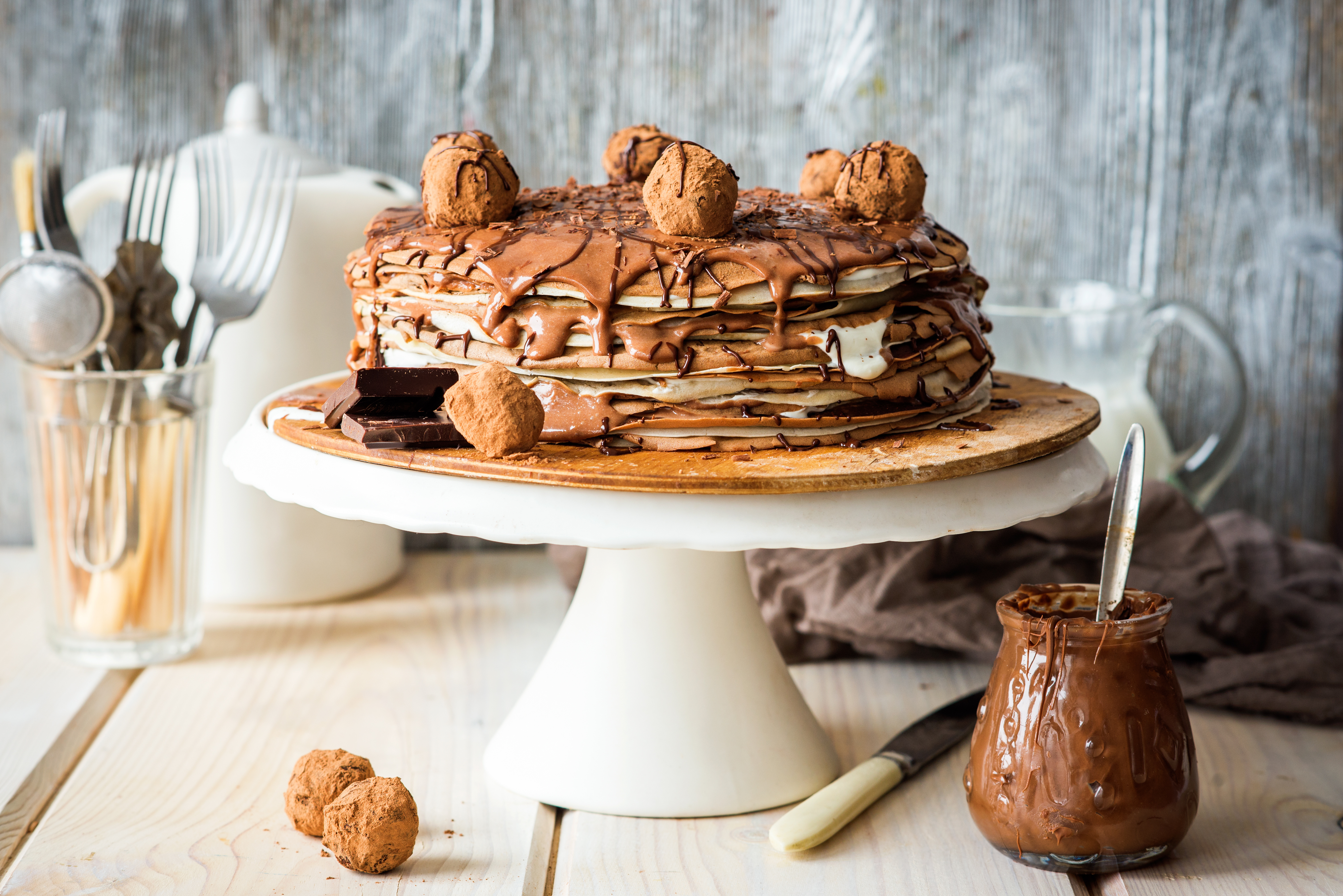 Crepe,Cake,With,Chocolate,Spread,And,Vanilla,Cream,And,Truffles