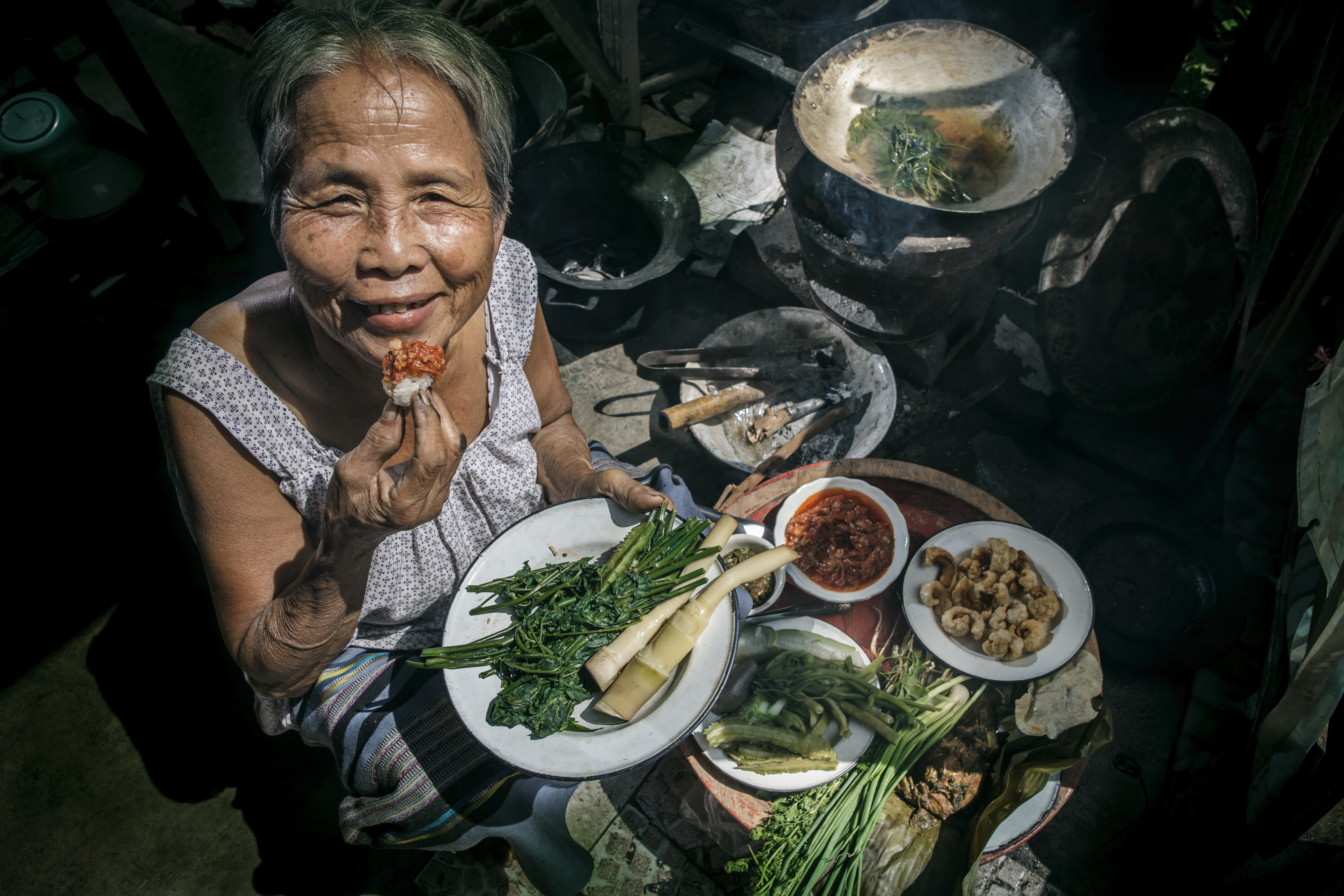 Senior,Woman,Eating,In,The,Kitchen,,Lifestyle,Of,Asian,Old