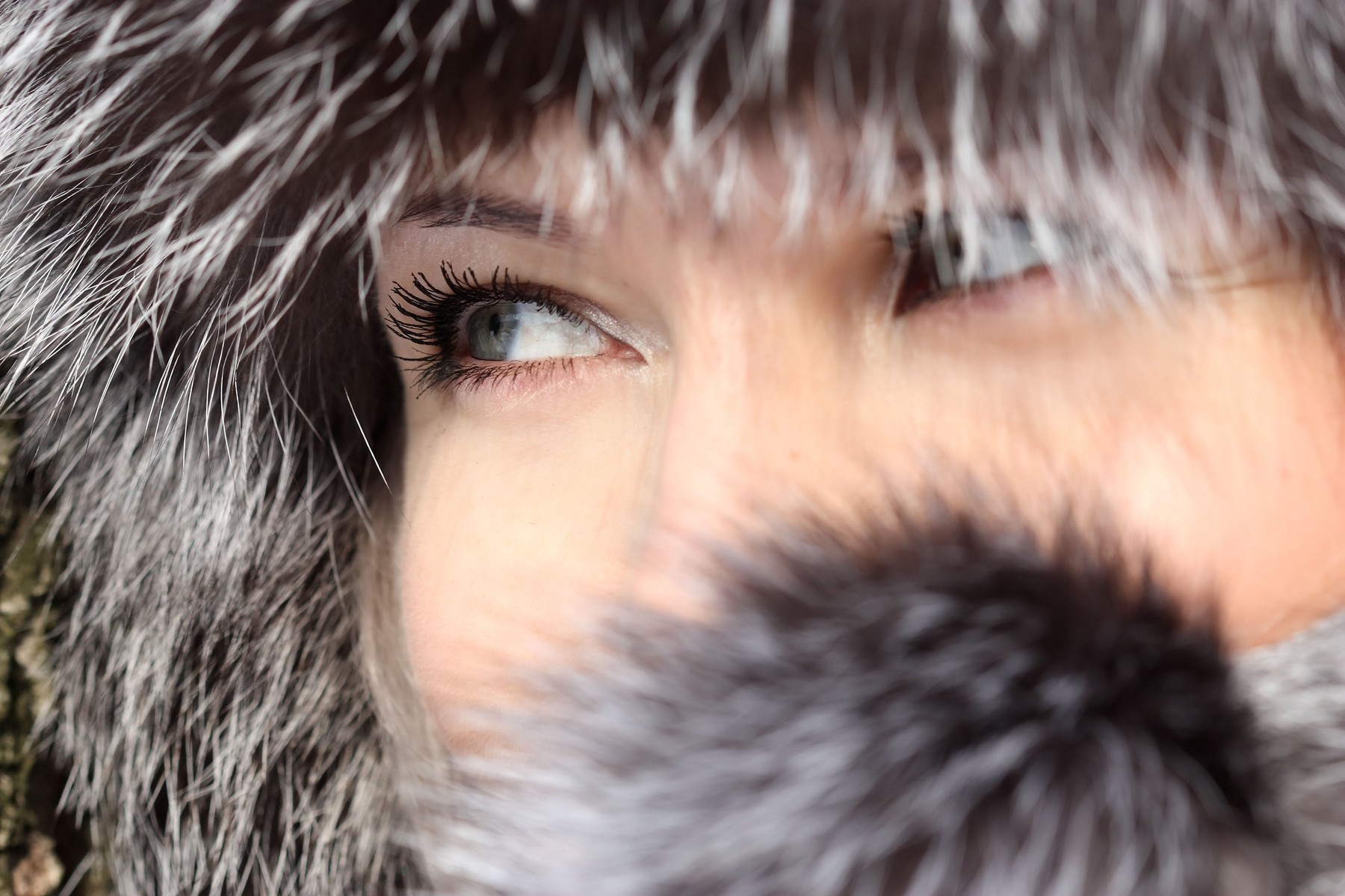 Beautiful woman in winter fur coat