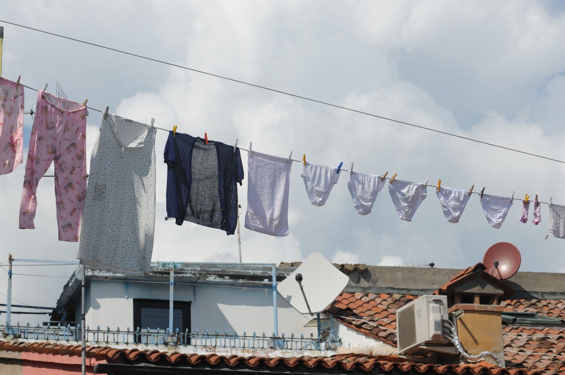 Italy, Burano island - Venice: The art to dry clothing. Underwear hanging to dry