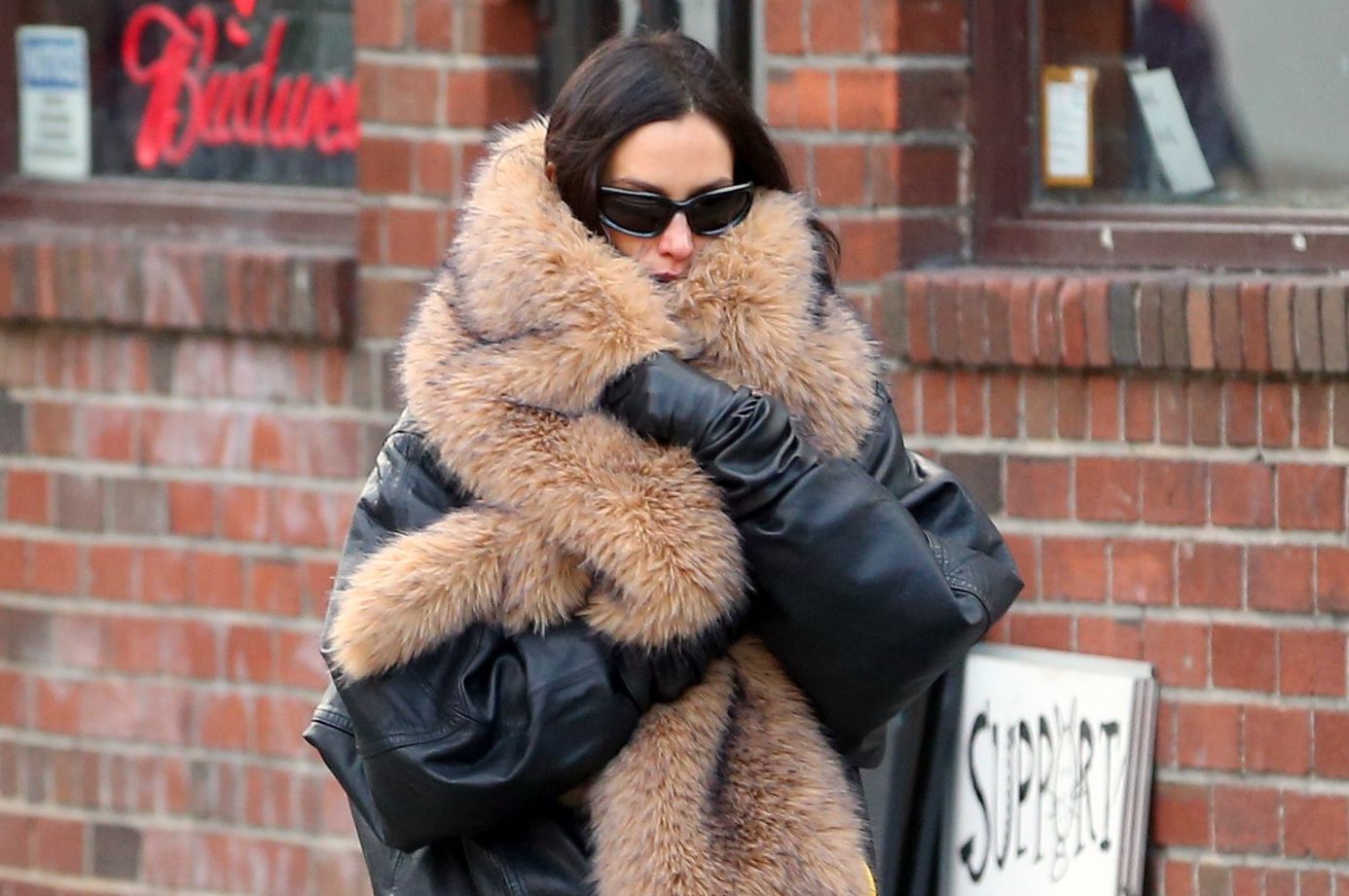 Irina Shayk is bundled up in a bear claw scarf on a bitter cold day in New York City