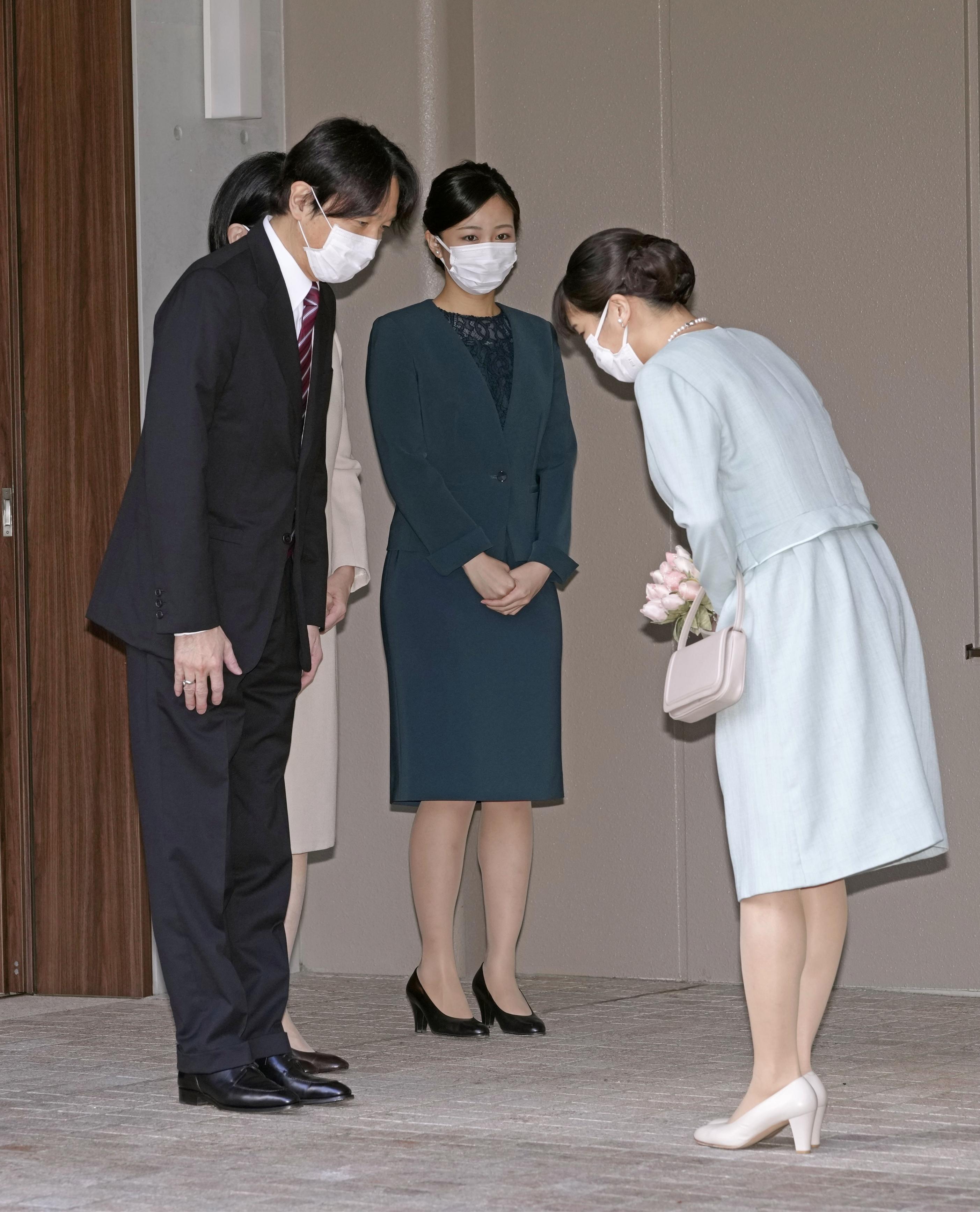 Japanese Princess Mako (R) leaves her family's residence