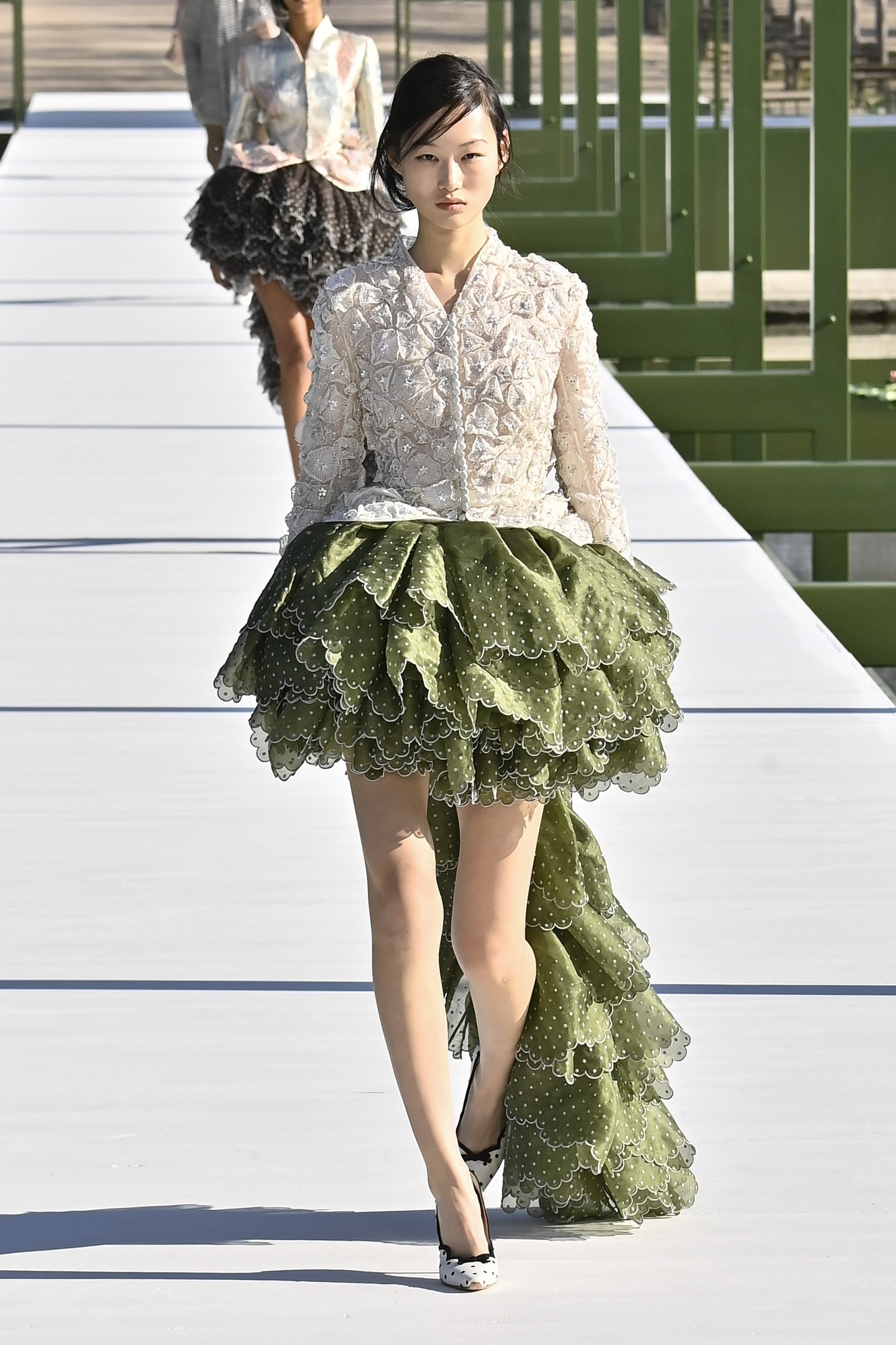 Model Zhao Ziqi is seen on the catwalk at the Dior fashion show