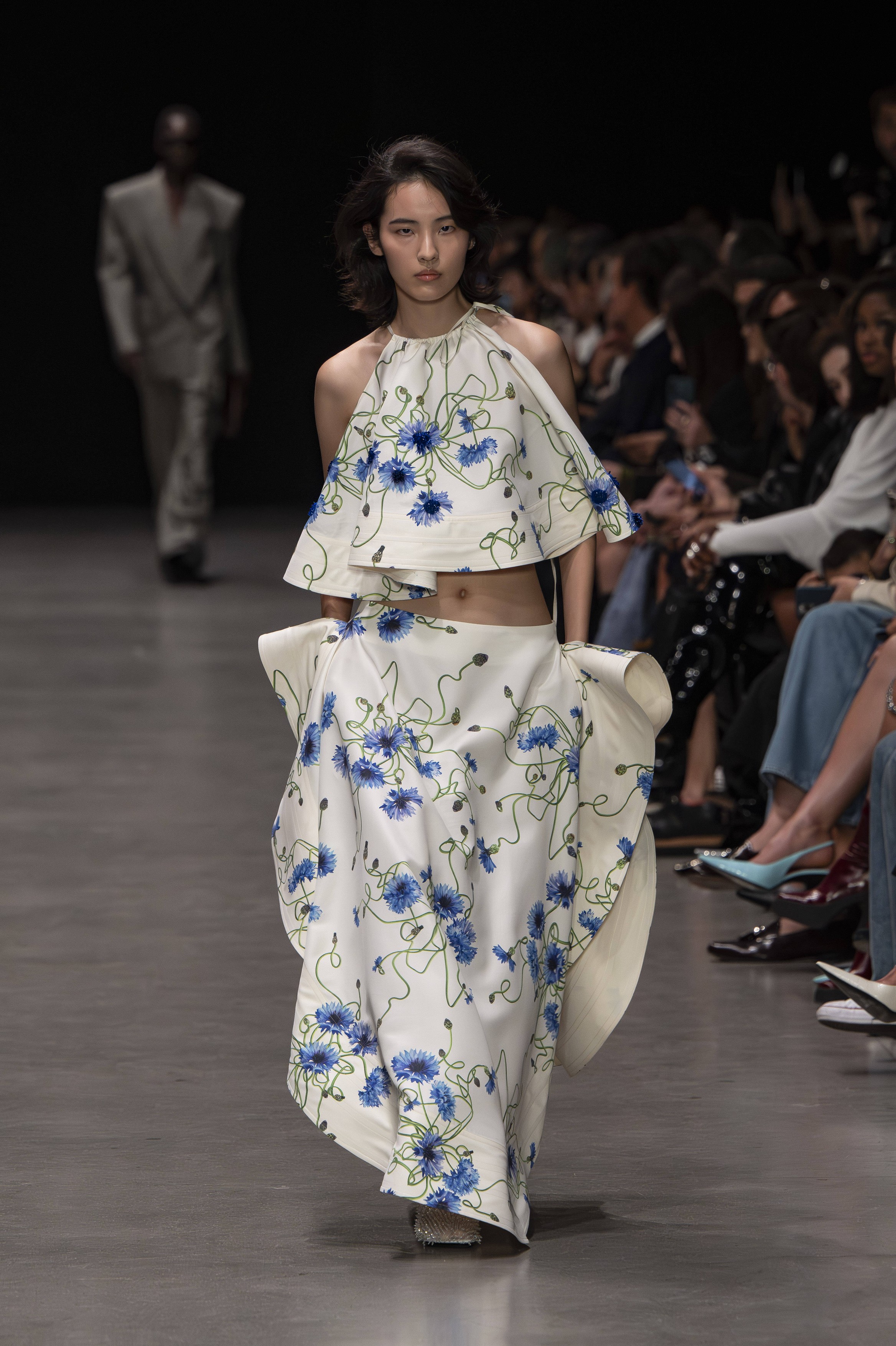 A model wearing an original creation from the Womenswear spring