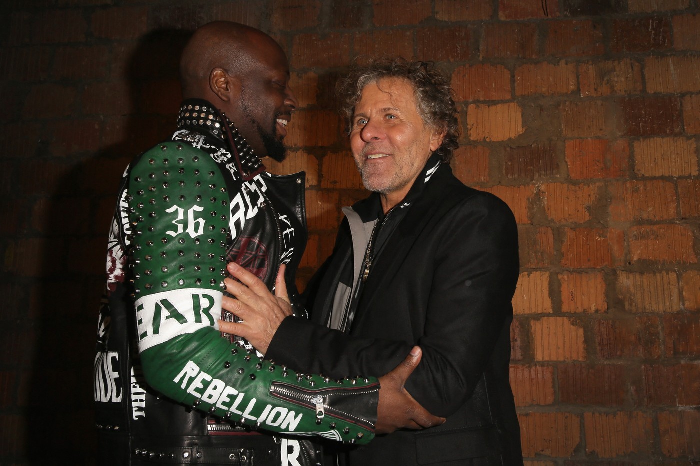 NEW YORK, NY - FEBRUARY 17: Rapper Wyclef Jean (L) and president of OTB Group, Renzo Rosso pose backstage at the Diesel B