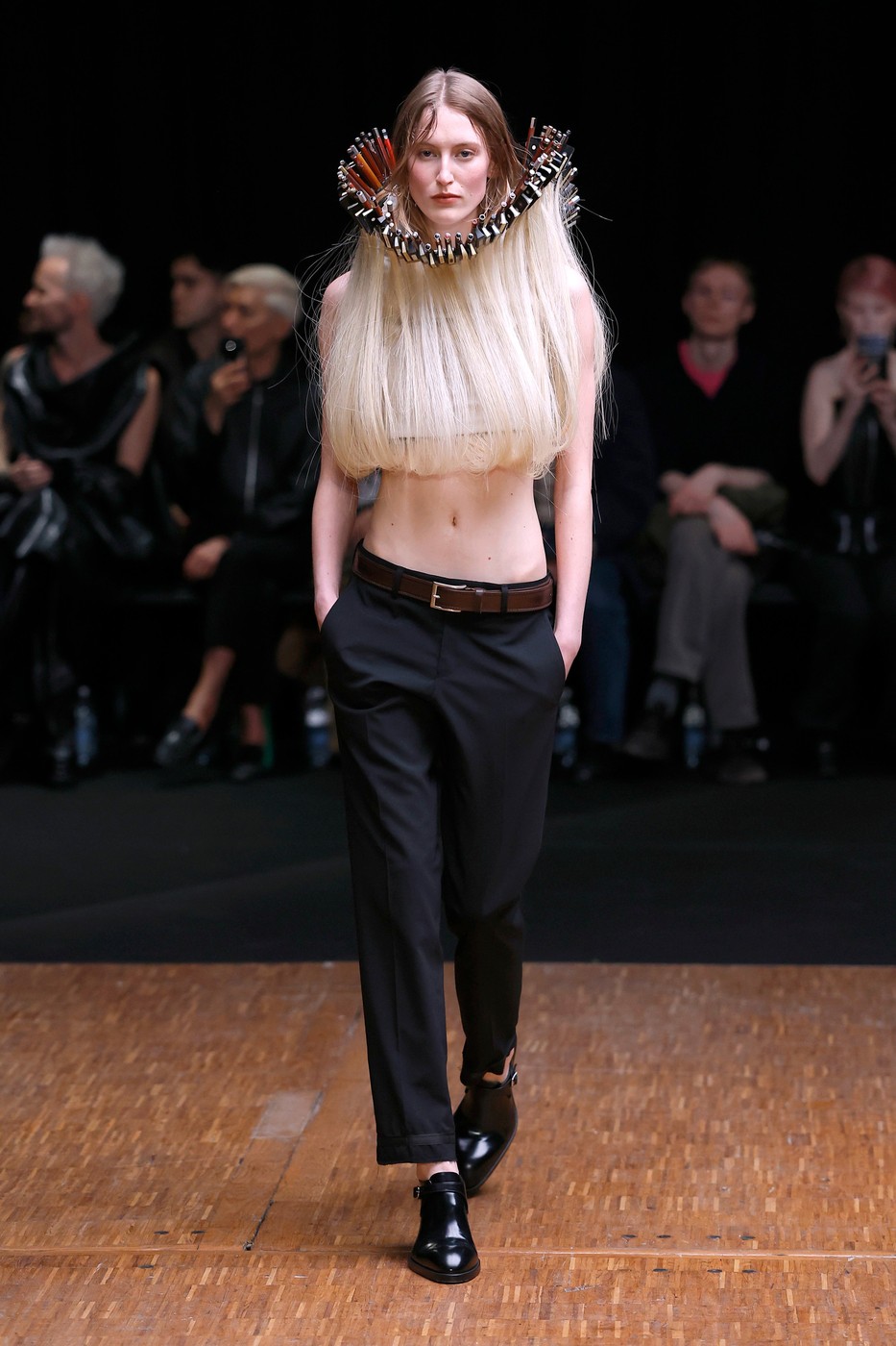 Model on the runway at the Hodakova