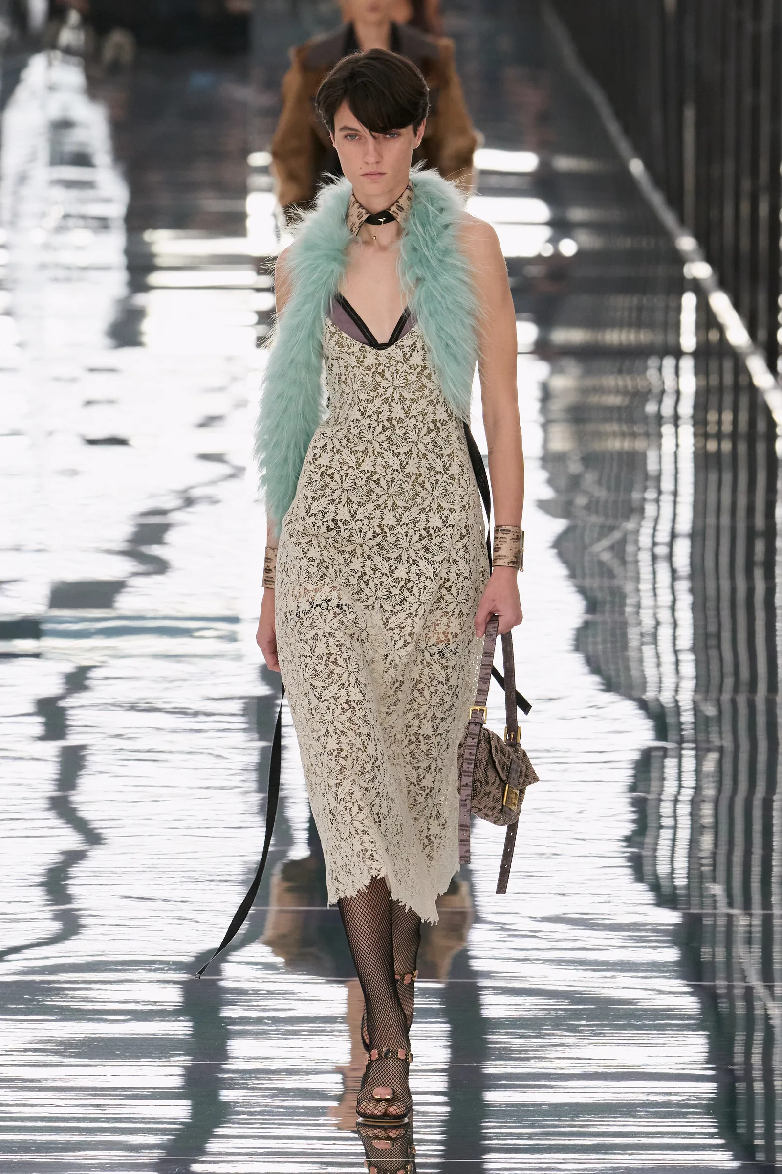Model walk the runway at the Fendi show during Milan