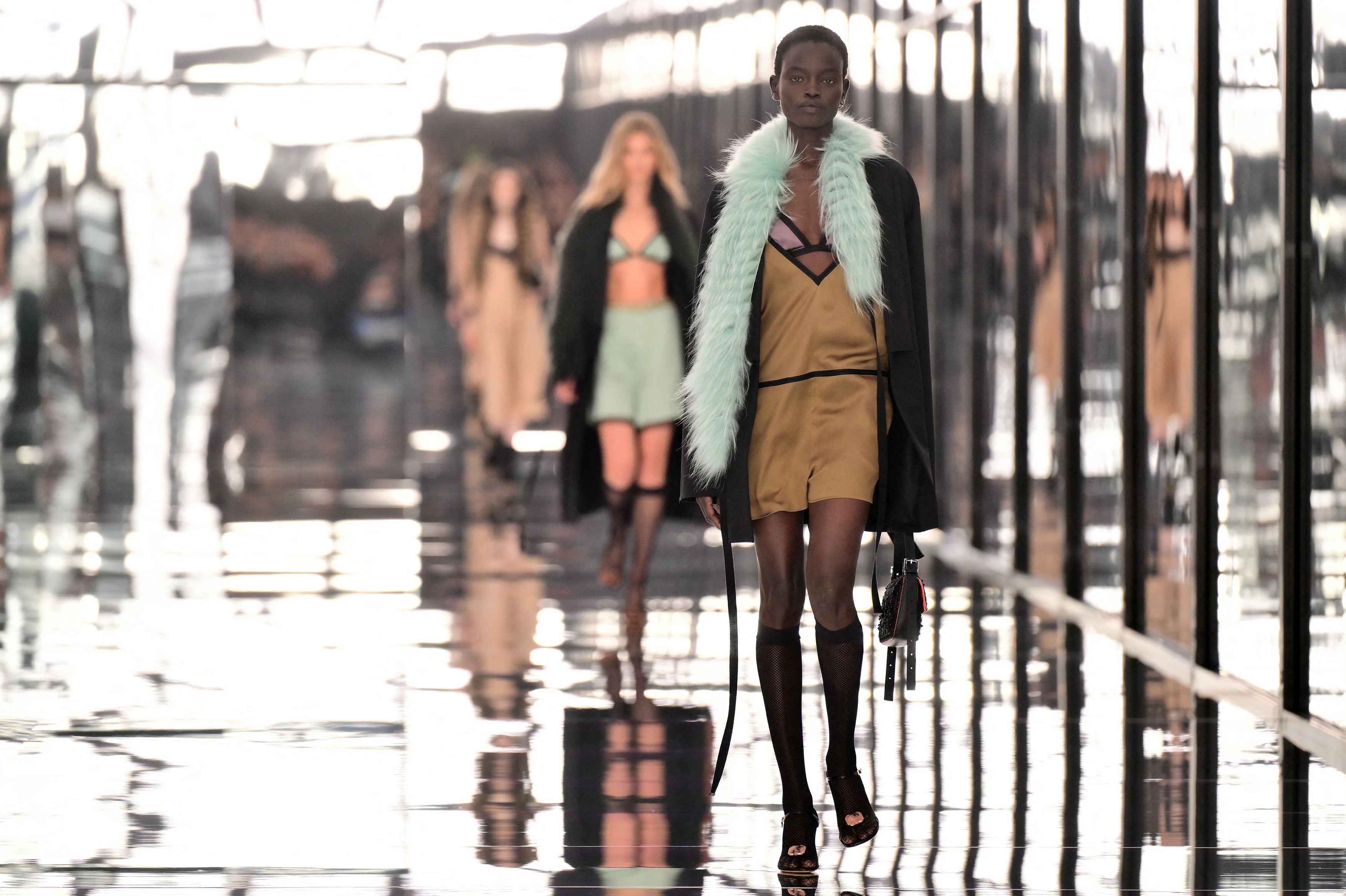 A model walks the runway during the Fendi collection