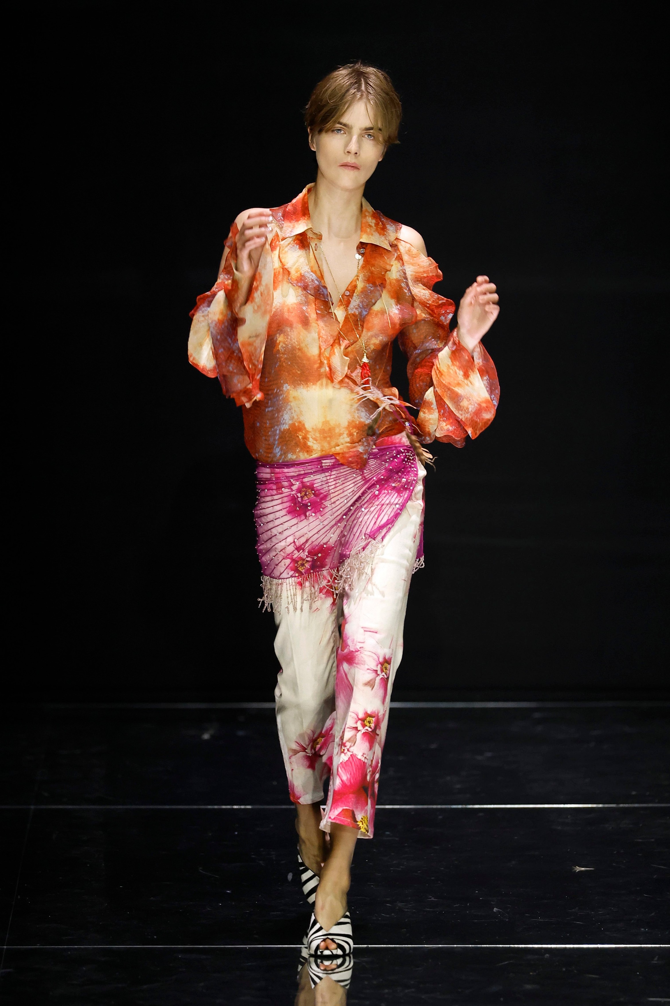 Model on the runway at the Roberto Cavalli fashion show