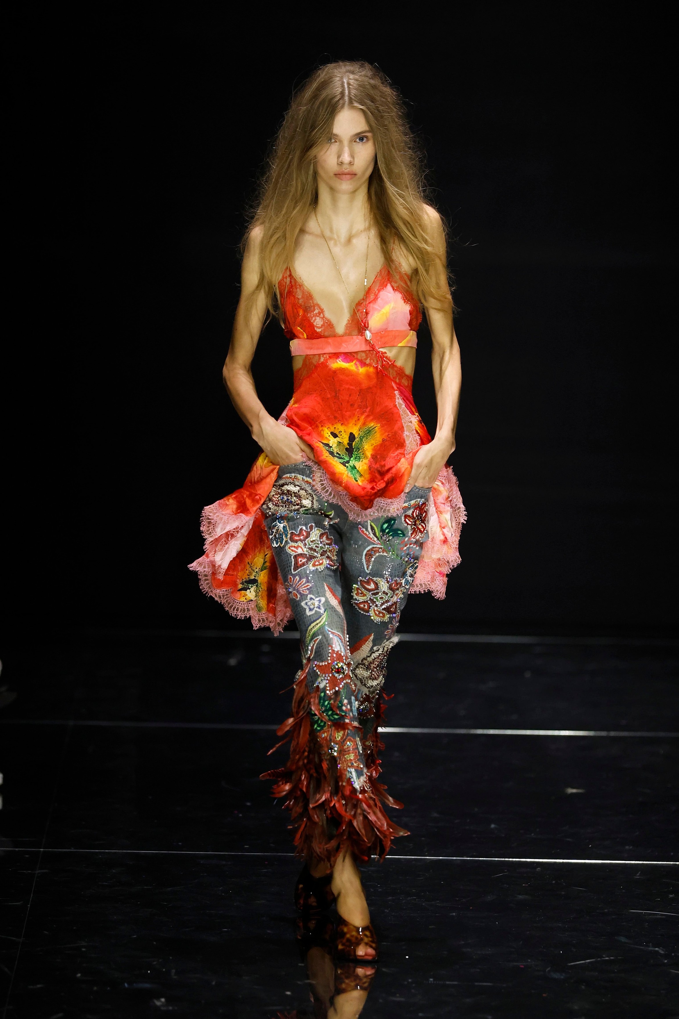 Model on the runway at the Roberto Cavalli fashion show
