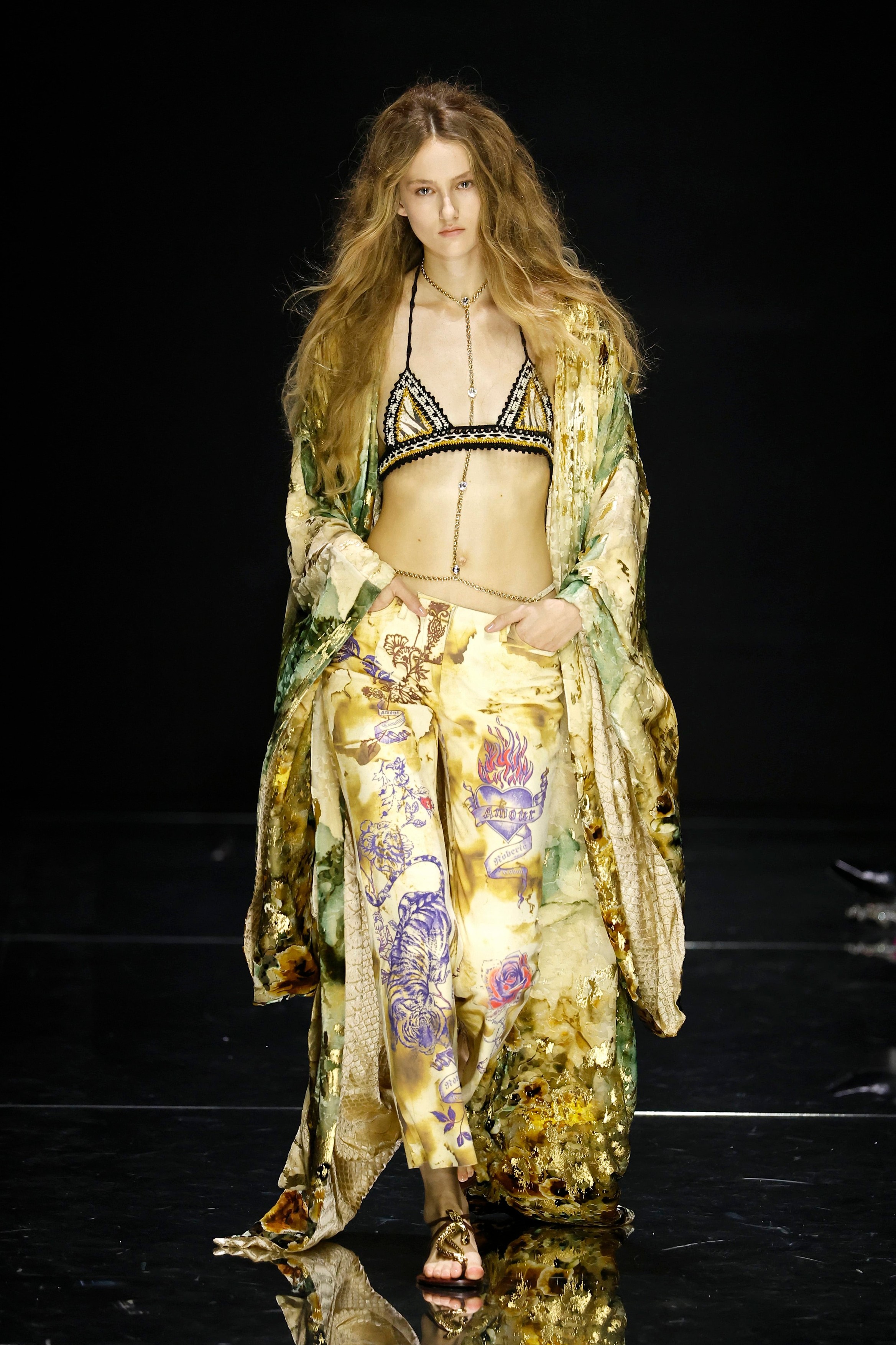 Model on the runway at the Roberto Cavalli fashion show