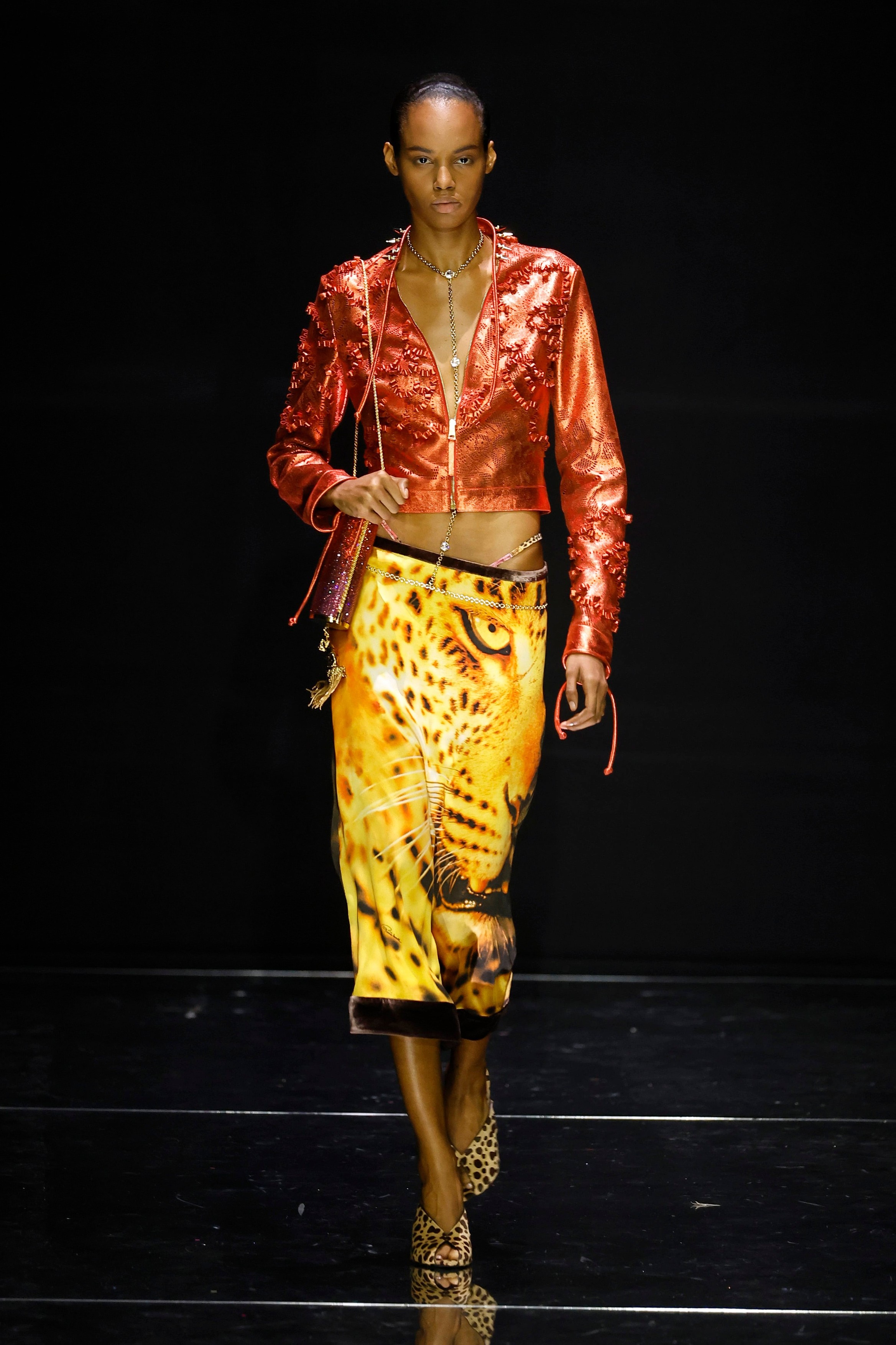 Model on the runway at the Roberto Cavalli fashion show