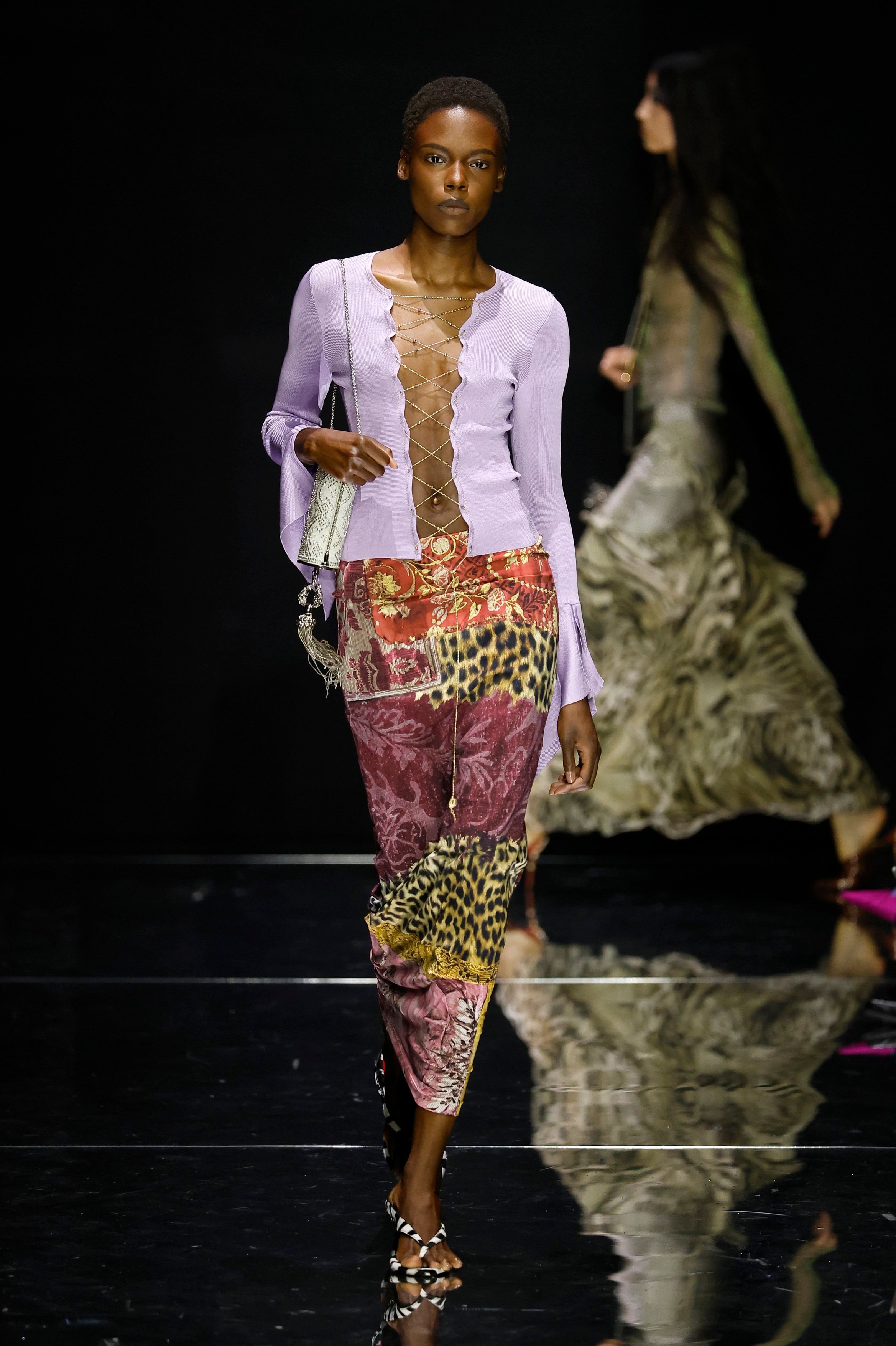 Model on the runway at the Roberto Cavalli fashion show
