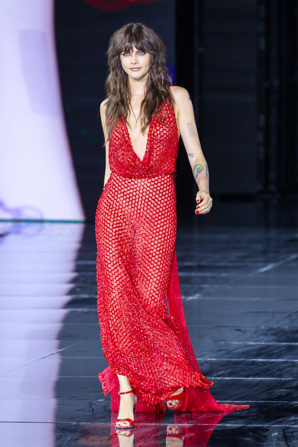 Cara Delevingnewalking on the runway