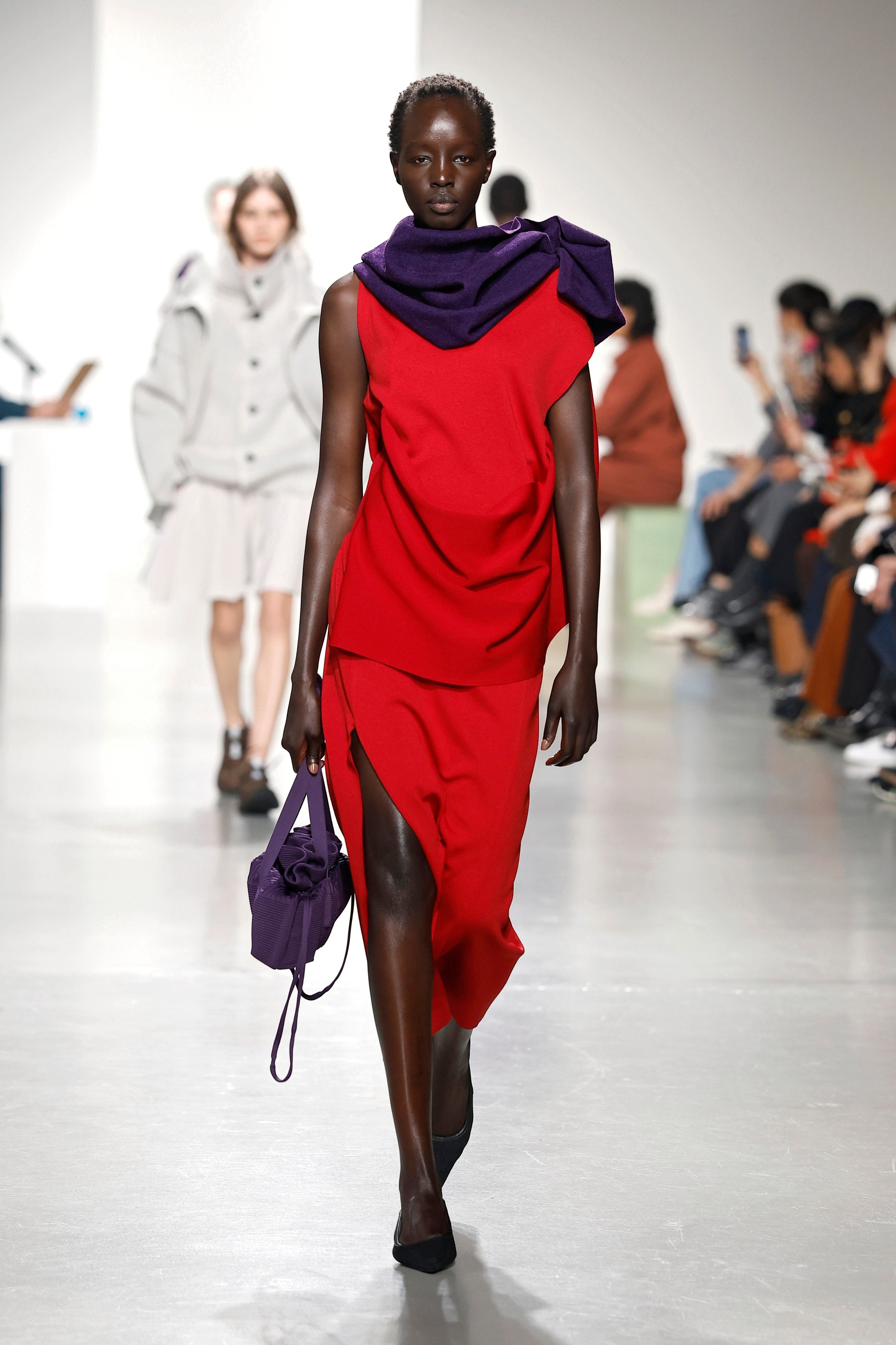 Model on the runway at the CFCL fashion show in Paris